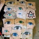 Graffiti auf Altpappe - Gesichter und Augen