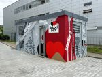 Graffiti Auftrag für Queisser Pharma: Doppelherz-Motiv auf Trafostation in Flensburg