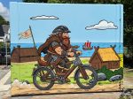 Graffiti Comic Schleswig mit Wikinger Motiv auf einem Beton WC